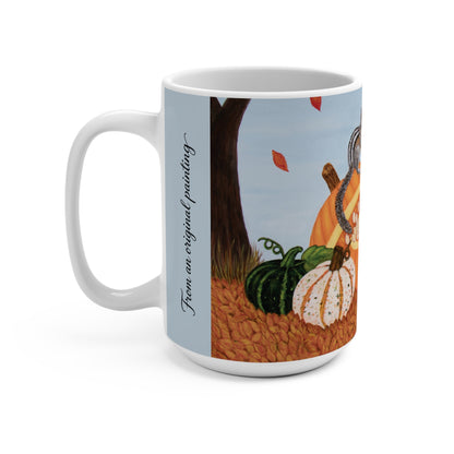 A white ceramic coffee mug featuring a printed autumn-themed painting with pumpkins, a tree trunk, falling leaves, and the text 'From an original painting' on a light blue vertical band.