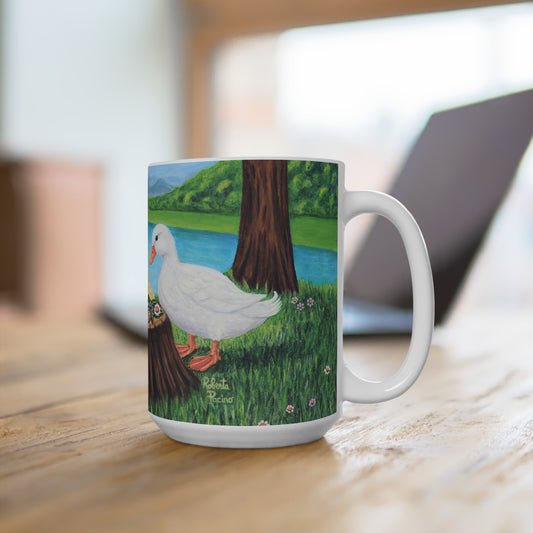 15 oz white ceramic mug featuring Sunlit Supper by Roberta Pacino with two white ducks and three ducklings gathered around a tree stump near the water